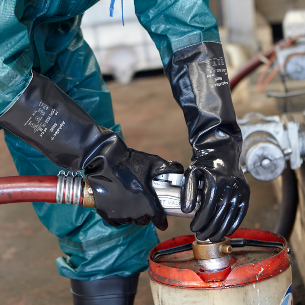 Ansell AlphaTec 09-928 gloves in use during chemical handling on industrial worksite