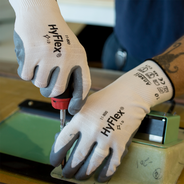 Angled view of HyFlex 11-800 glove demonstrating form-fitting design and coated fingertips for precision handling.