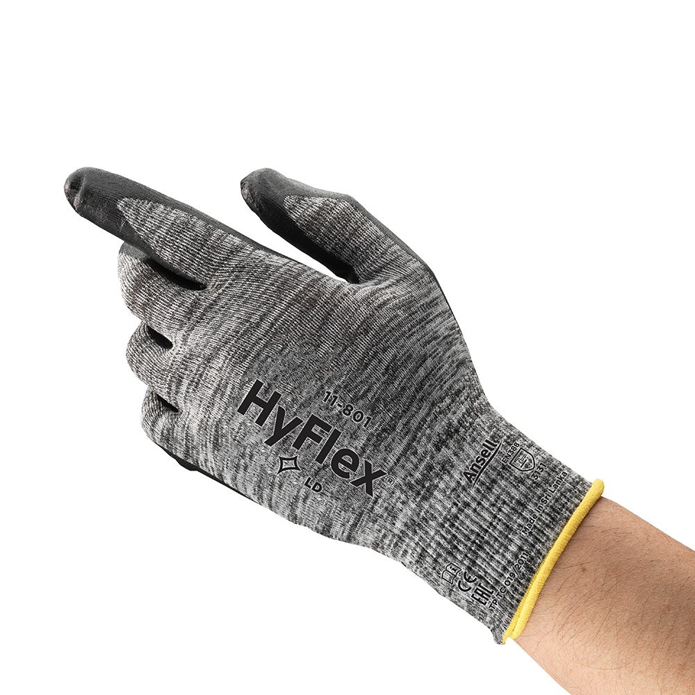 Angled view of Ansell HyFlex 11-801 glove worn on hand with fingers slightly pinched, highlighting ergonomic fit and flexibility.