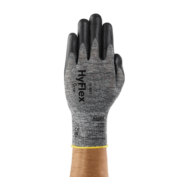 Front view of Ansell HyFlex 11-801 glove showing grey seamless liner with black palm coating, worn on hand for product display.