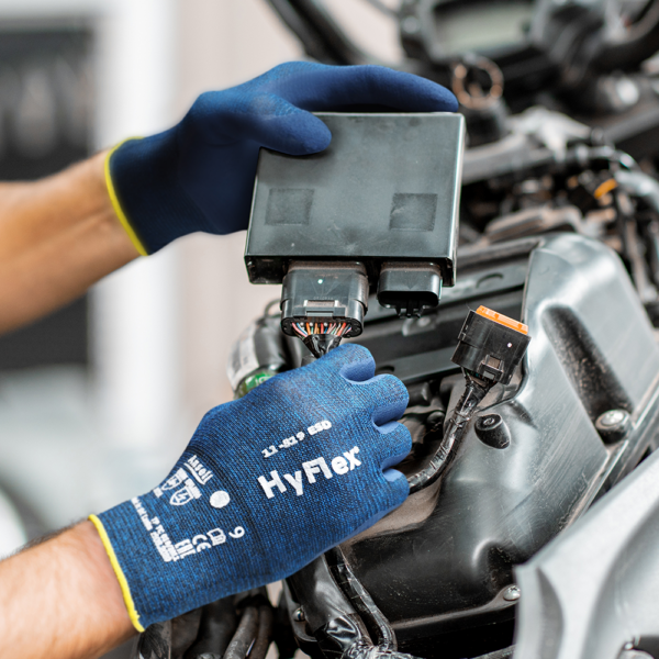Ansell HyFlex 11-819 ESD gloves used for precise handling of electronic components in automotive work