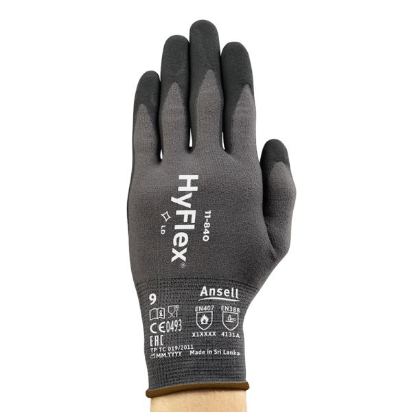 HyFlex 11-840 glove worn on hand, palm facing camera, showing model number and certification markings.