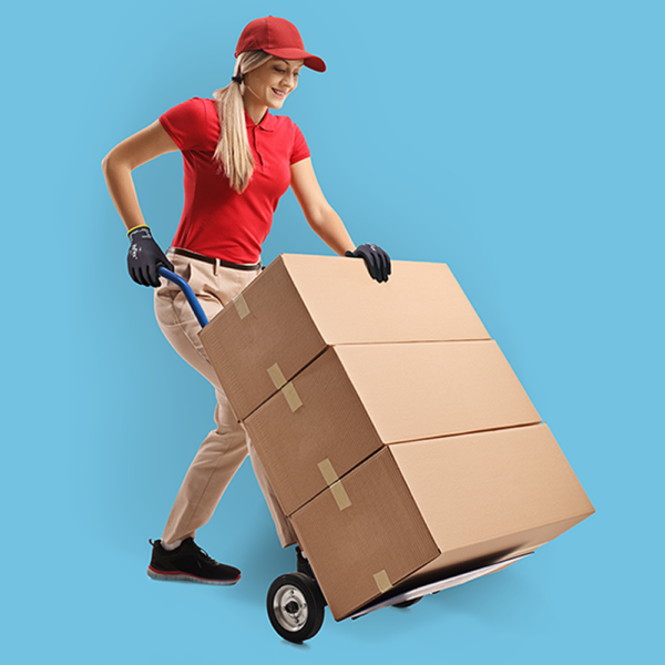 Delivery worker using a hand trolley while wearing HyFlex 11-840 gloves for general handling.