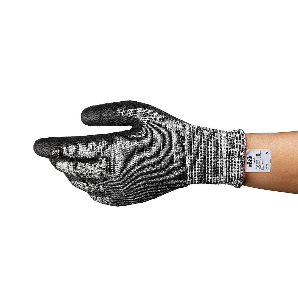 Side view of Ansell EDGE 48-705 glove showing ergonomic fit and product label.