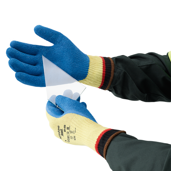 Hands wearing Ansell ActivArmr 80-600 gloves safely handling sharp glass sheet