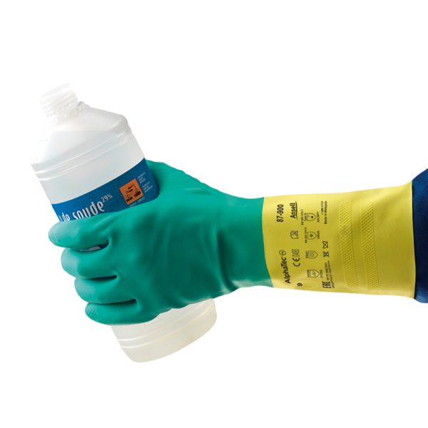 AlphaTec 87-900 glove in use holding a sodium hydroxide chemical bottle to demonstrate grip and protection