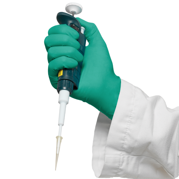 Gloved hand using a pipette for liquid handling in a laboratory environment.