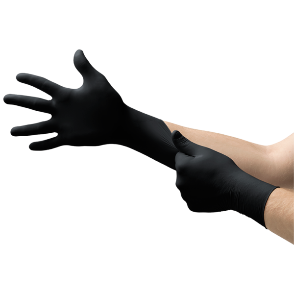 Hands putting on a black Microflex 93-852 nitrile glove with a snug fit around the wrist