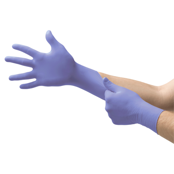 Person putting on a Microflex 93-853 long cuff nitrile glove, showcasing extended forearm coverage
