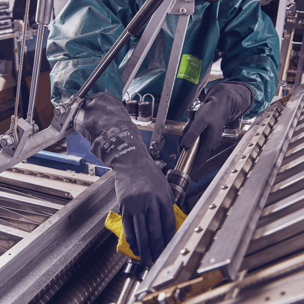 AlphaTec 38-001 durable gloves providing hand protection during machinery maintenance and cleaning tasks