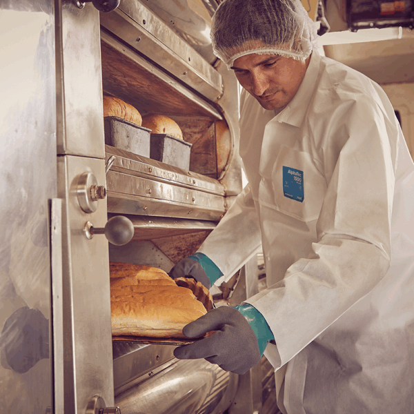 Ansell AlphaTec gloves used in bakery for safe handling of hot trays and food preparation equipment